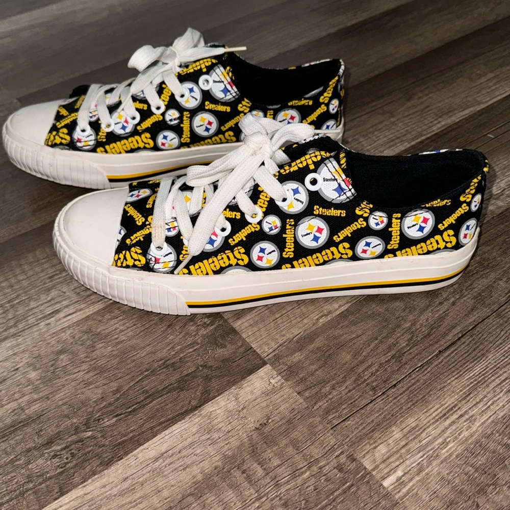 Steeler sneakers. Use but like new. Selling as is.